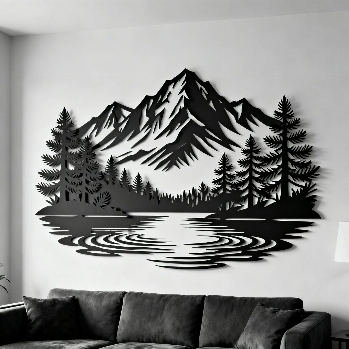 Black metal mountain landscape wall art above a dark grey living room sofa