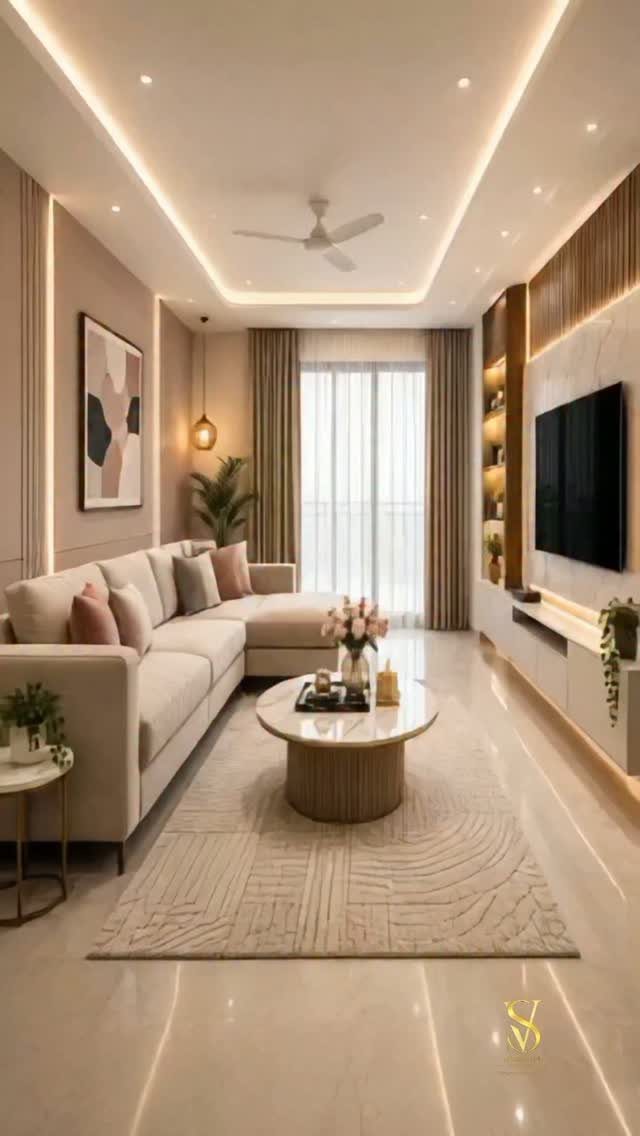 Beige sectional sofa in a living room with warm recessed ceiling lighting.