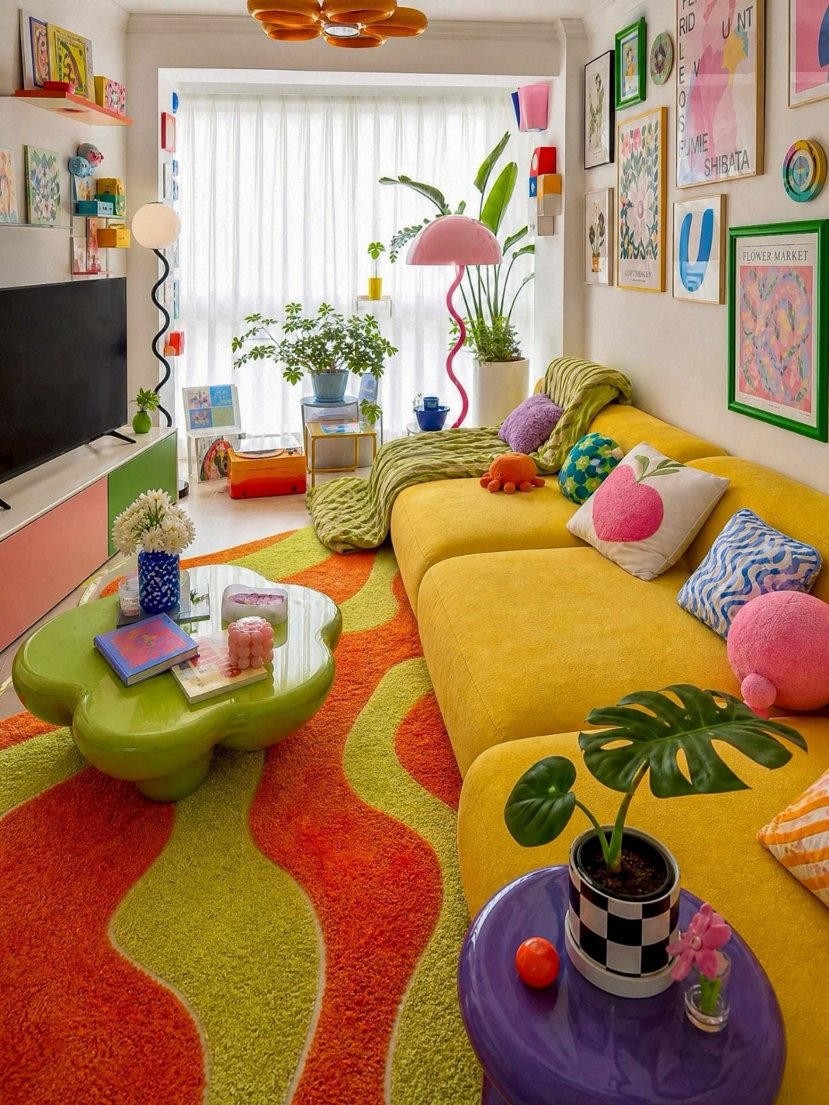 Yellow modular couch in a colorful living room with a wavy orange rug.