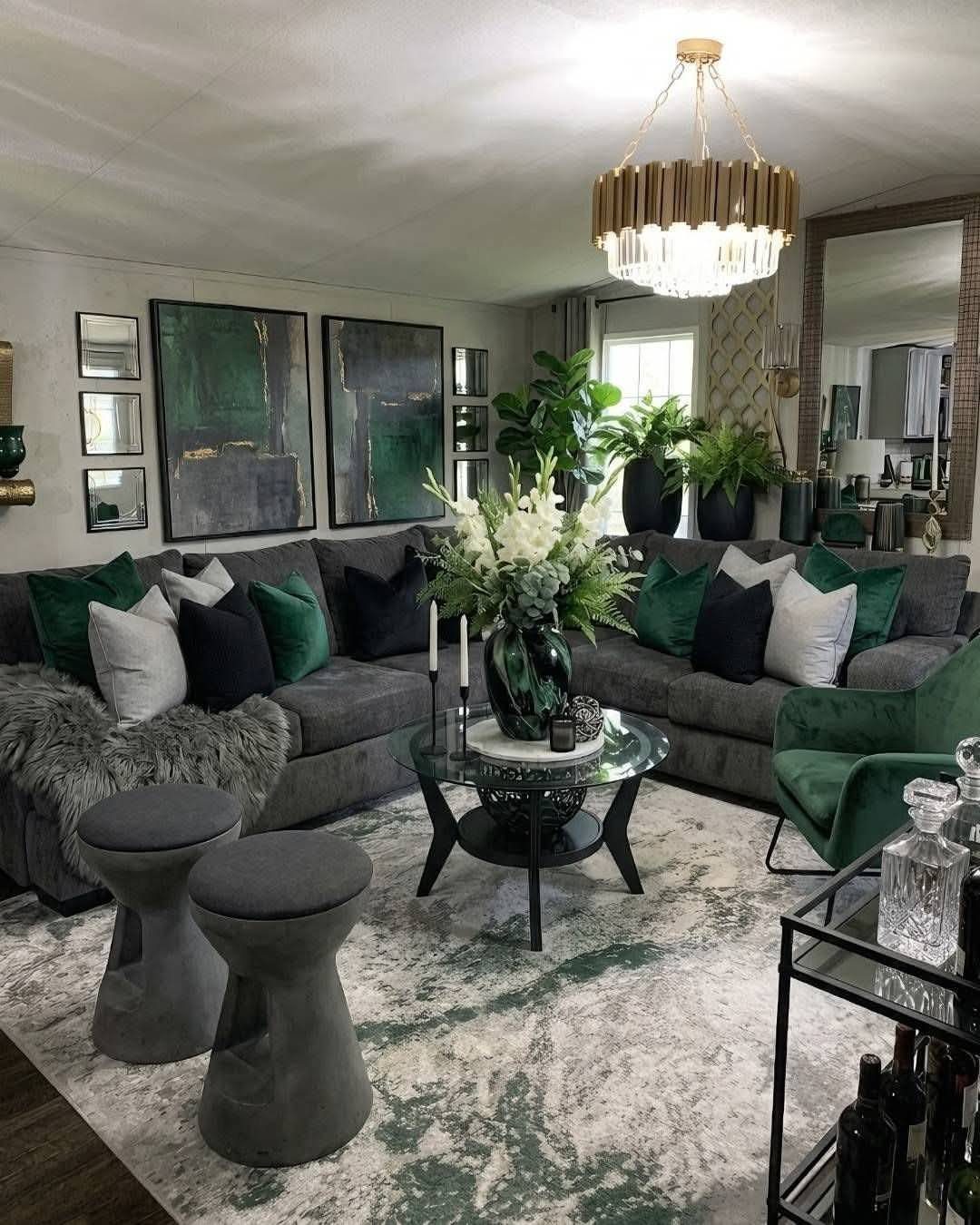 White and green marbled rug in a modern living room with grey furniture.