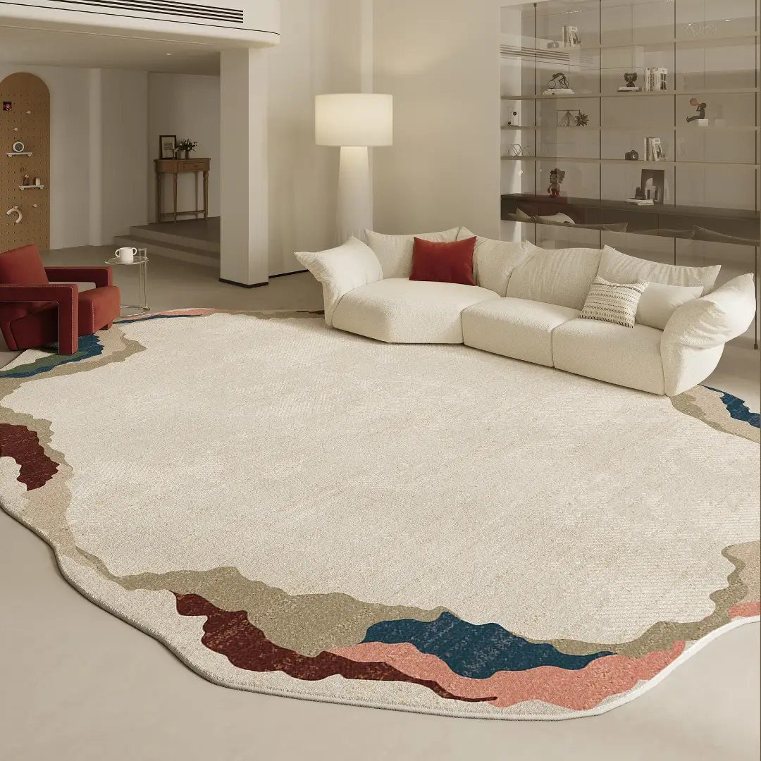 Irregularly shaped cream rug with colorful borders in a modern living room setting