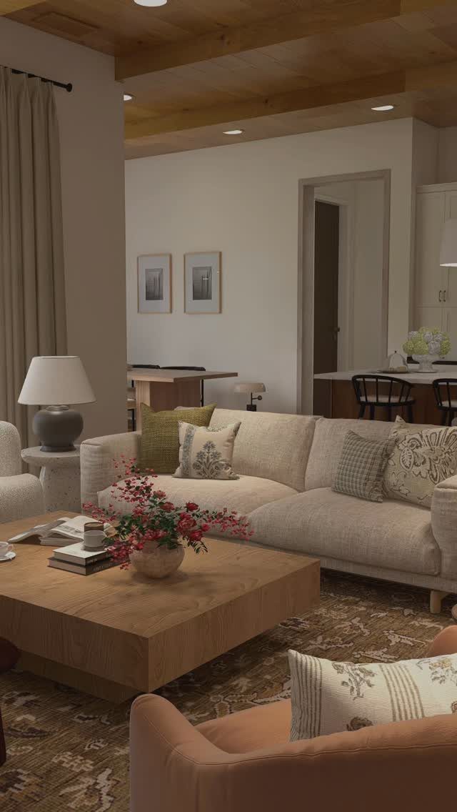 Peach accent chair in a living room with a beige sofa and wooden table.