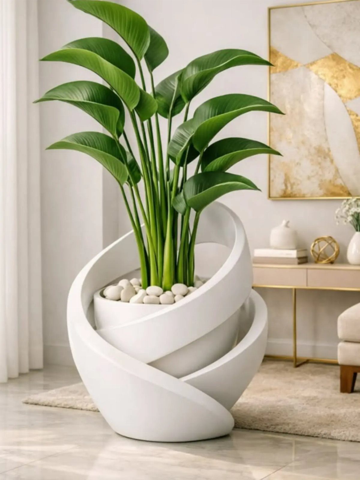 Sculptural white ceramic vase with a green plant in a modern living room