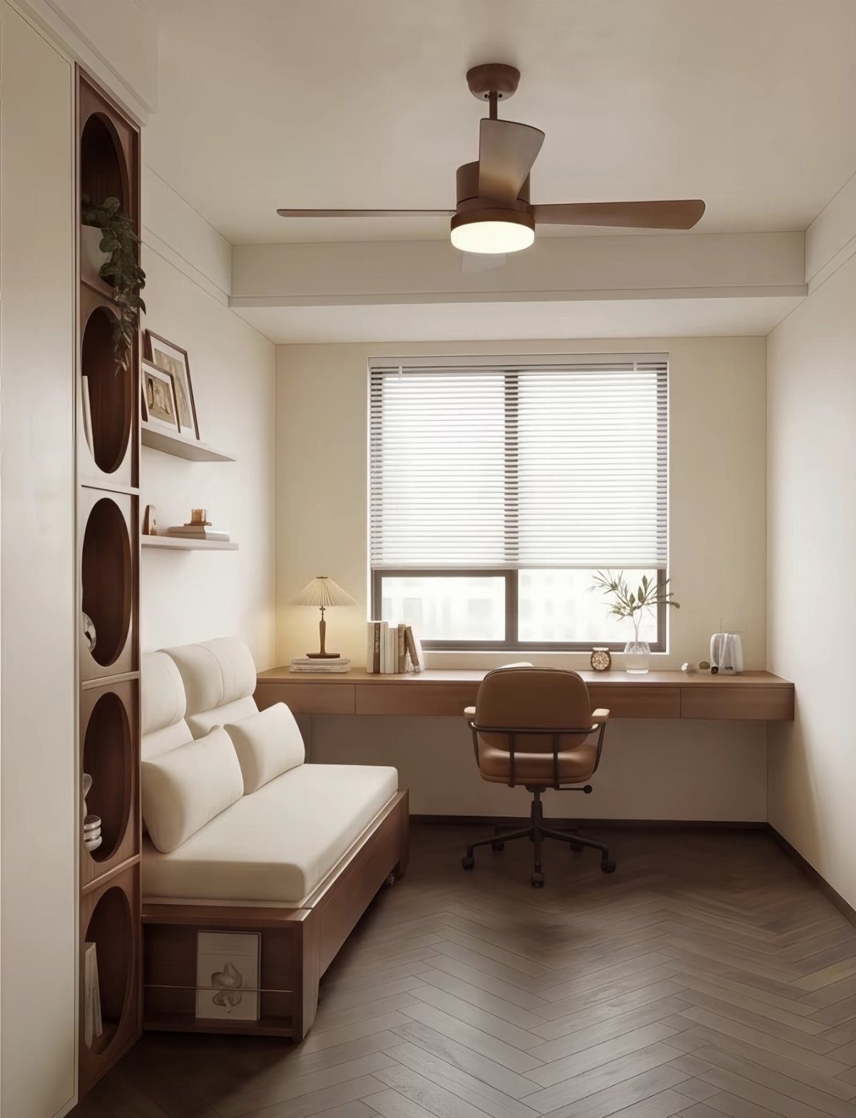 White daybed and wooden built-in desk in a modern home office with herringbone floors.